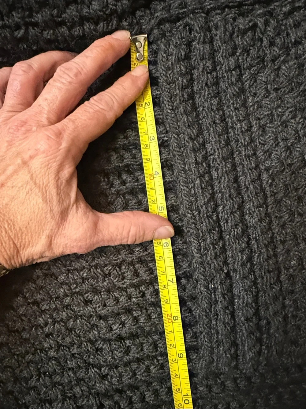 Artisan Black Ribbed Knit Throw Blanketwith pockets for storing things on couch